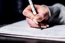 womans hand writing